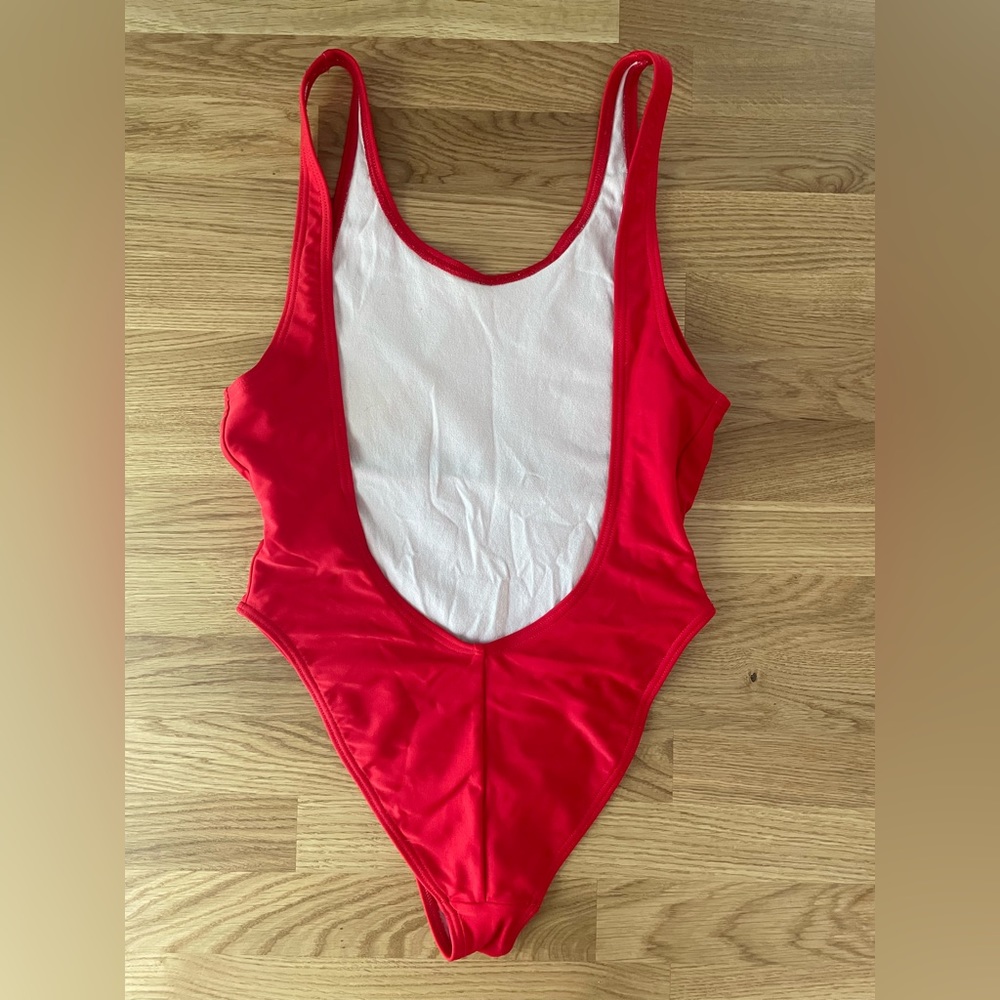 Red Super Low Back One Piece Swimsuit (it’s giving Baywatch)